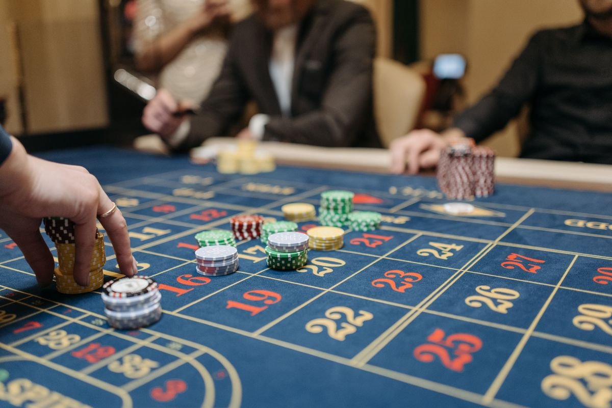 roulette table with chips - how do casinos make money explained